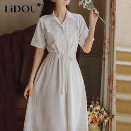 Robes de soirée été 2024 style coréen imprimé rayé élégant mode ceinture robe femmes manches courtes simples boutons robe a-ligne robes