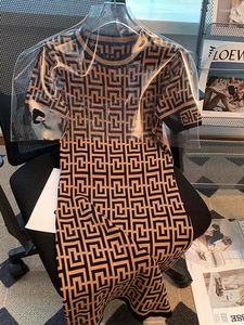Robes de soirée Vintage élégant Jacquard tricoté robe crayon femmes 2024 été mode coréenne dames mince à manches courtes col rond robe