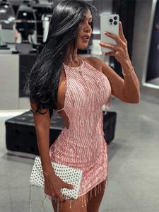 Feestjurken vrouwen solide mouwloze halter backless bodycon tassel mini jurk club avond sexy verband slip 2023 zomer zwart y2303