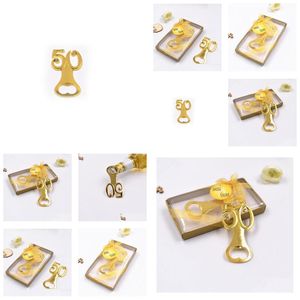 Party Gunst 100pcs/Lotaddgolden Wedding Souvenirs Digital 50 Bottle Opener 50e verjaardag jubileumcadeau voor gast SN2562 Drop Deli DHZ75