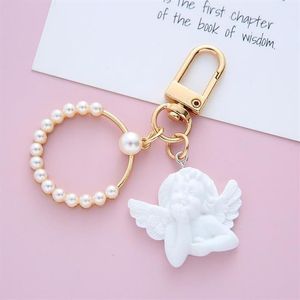 Party Favor 10pcs Baby Shower Baptême Coeur Ange Porte-clés Fille Garçon Baptême Cadeau Mignon Cadeau Souvenir199K