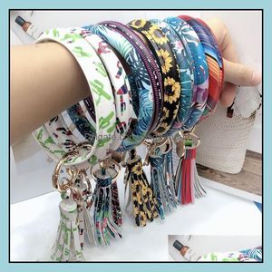 Party Gunst 24 Styles Colorf PU Leather O Key Chain Custom Assel Polsband Bracelet Keychain Bangle Women Girl Ring Pols Trap Drop OTDN9