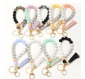 Partij Gunst 9 Kleuren Houten Kwastje Bead String Armband Sleutelhanger Food Grade Siliconen Kralen Armbanden Dames Meisje Sleutelhanger Polsriem SN3134