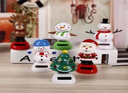 Feestartikelen Auto-ornamenten ABS Zonne-energie ChristmasOrnaments Cadeau Dansen Kerstman Sneeuwpop Speelgoed Dashboard Decoratie Bobbel D3331633
