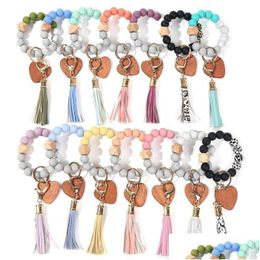Party Gunst FedEx 14 Colors Love Wood Chip Bracelet Keychain Polstlet Key Chain Sile Bead Tassels Handchain Ring Drop levering Home GA DHQCP