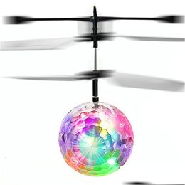Party Favor Flying Rc Ball Aircraft Helicopter Led Flashing Light Up Toy Induction Electric Drone For Kid Children Drop Delivery Hom Dhe9Q