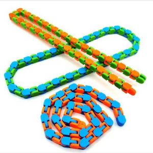 Favor de fiesta Regalos 9 Tipo Fidget Toys Enlaces Serpiente Rompecabezas Simple Hoyuelo Clásico Sensorial Juguete Wacky Tracks Snap Click Descompresión Niños Autismo