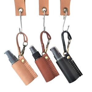 Porte-désinfectant pour les mains avec bouteille en cuir PU, porte-clés avec pompon, étui de désinfectant portable, porte-bouteilles vides, porte-clés pour cadeau