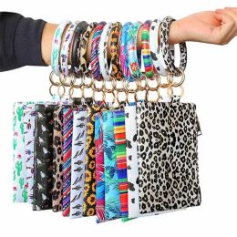 Feest gunst pu armband sleutelhanger lederen pols sleutelring ronde ronde luipaard portemonnee armbanden handtas hanger portemonnee dame koppeling tas munt make -uptassen nieuw