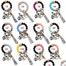 Party Favor Sile Cursive Cow Bead Bracelet Bois Disque Porte-clés Gland Ox Tête Poignet Porte-clés Charme Pendentif Accessoire En Gros Drop De Dhuyf