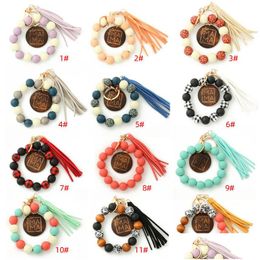 Party Favor Sile Keychain para teclas Tasel Wood Beads Bracelet Keyling Mujeres Mticolor Keychains Drop entrega dhtt7