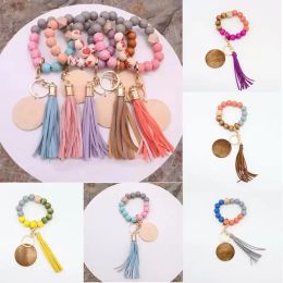 Favor de fiesta Llavero de silicona Pulsera con cuentas Wrislet Llavero Portátil Casa Coche Titular Muñequera para mujer Brazalete Lindo Llaveros Cadenas Chica con borla de cuero