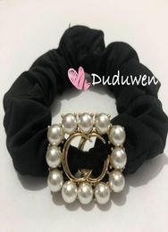 Party Gift Classic Metal G ELASITC Band Fashion Pearl Hairtie Classical Hair Rope V Regal Collection Rubber6690957