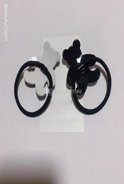 Regalos de fiesta Fashion en blanco y negro acrílico Cabeza de oso pequeño Anillo de cabello Caja de goma para damas Accesorios de tocado favorito60277710