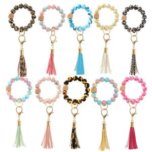 Patrón Silicone Bead Pulsera Llavero Suede Tassel Llavero Llavero Girasol Impreso Brazalete Festival Regalo de madera con cuentas de madera Jewered Crafts 10 estilos