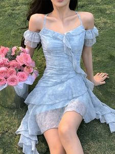 Robe de soirée à bretelles Spaghetti pour femmes 2023 nouvelle mode doux cou monté robe d'été français élégant Floral Mini robe