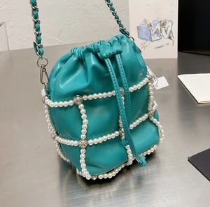 Sac à bandoulière en filet de perles pour femmes, petit design exquis et à cordon de serrage, style élégant, pochette en cuir souple pour femmes