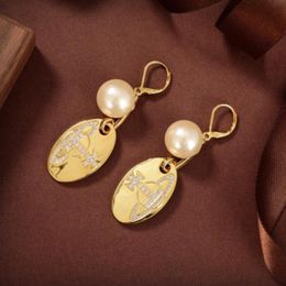 Perle ovale pendentif femme boucles d'oreilles Stud Western Queen planète étoile aura haute qualité bijoux de luxe femmes Saturn boucle d'oreille concepteur bijoux cadeaux ER-582