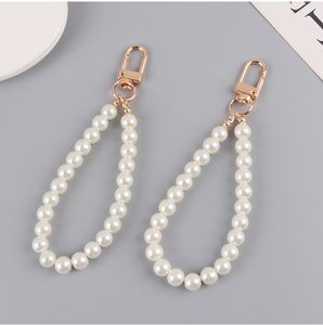 Perles perlées alliage porte-clés pour femmes nouveau sac de voiture minimaliste Bluetooth casque porte-clés pendentif bijoux en gros