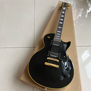 Pinnen Dit is een klassieke 6string -elektrische gitaar met een zwart helder gezicht.Het heeft een prachtig uiterlijk en een prachtig timbre.