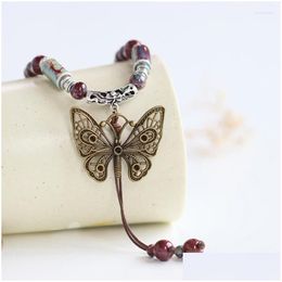 Colliers pendants 1pcs Perles de papillon vintage Collier de chaîne tissée longue pull en céramique Pull de style ethnique Drop Livraison de bijoux Dhvhj