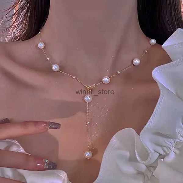 Collares colgantes 2023 Nuevo collar de perlas de imitación larga simple para mujeres Sexy borla de perla arnés bikini cadena cofre joyería Mujerl231223