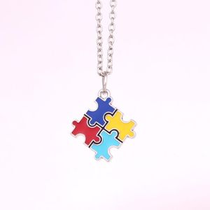 Hanger kettingen autisme puzzel stuk vier kleuren halsklare