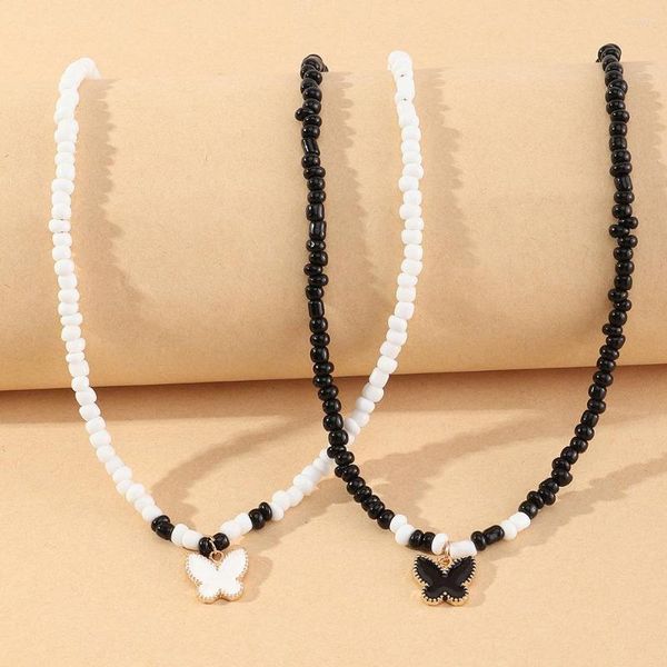 Pendentif Colliers Boho Noir Blanc À La Main Perles De Riz Collier Pour Les Filles Goutte D'huile Papillon Tour De Cou 2 Pcs Ensemble Coréen Simple Bijoux