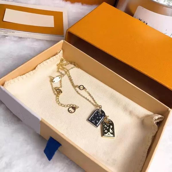 Collier de créateur bijoux de mode femmes chaîne en acier inoxydable double étiquettes pendentifs en or amoureux colliers de conception haut de gamme L028