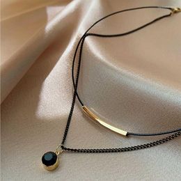 Pendentif Colliers Double couche en cuir corde chaîne de clavicule en cristal noir ligne sombre collier de pull pour femme de style européen et américain