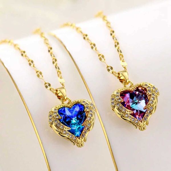 Colliers pendants exquis joli titane acier doré océan coeur collier femme en forme de coeur