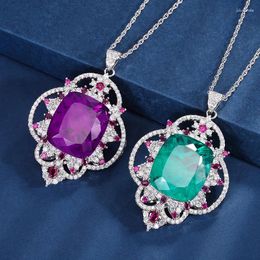 Collares colgantes EYIKA Diseño hueco de lujo creado Esmeralda Amatista Collar de mujer Púrpura Verde Fusión Cristal Zircon Flor