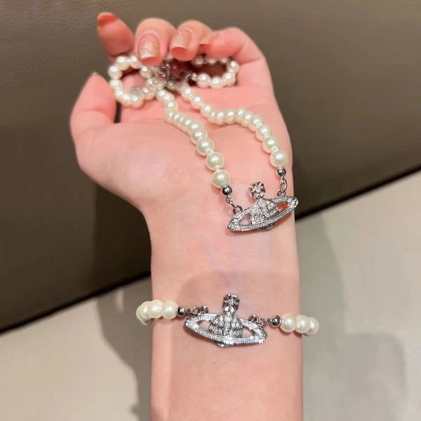Célèbre designer britannique perle pendentif Saturn collier Bracelet stéréoscopique 3d planète clavicule collier ras du cou Bracelets bijoux pour femmes