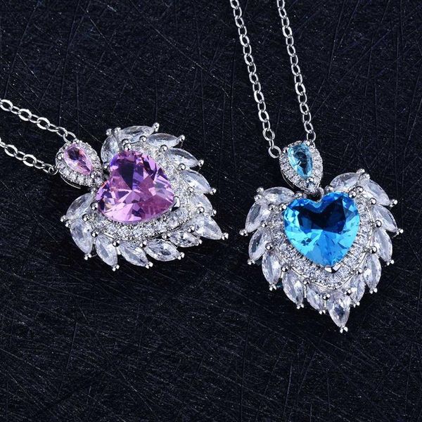 Collares pendientes Moda de lujo Diseño de temperamento Ala de ángel Collar de corazón de aguamarina simulado para mujeres Joyería fina al por mayor