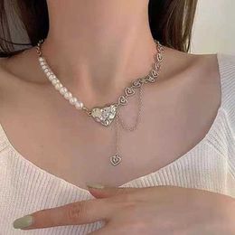 Colliers pendentifs Collier pendentif en forme de coeur creux chaîne brillante femme 2022 Jewelry Y2K irrégulier Bijoux de chocolat argenté S2452599 S