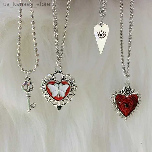 Colliers de pendentif bijoux goth coeur rouge collier gery oculaire hommes punk crâne verrouillage papillon