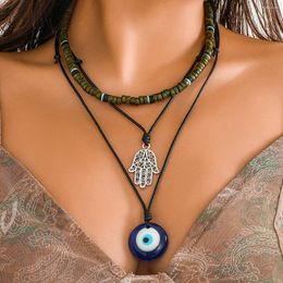 Pendentif Colliers Lacteo Fashion Perles de bois Strand Collier pour femmes Chaîne de corde avec grand motif d'oeil Collier acrylique Collier de bijoux à la mode