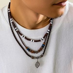 Pendentif Colliers Corde en couches et chaînes de perles de bois avec pendentifs de feuilles Collier hommes Accessoires de perles à la mode sur le cou 2023 Bijoux de mode