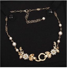 Colliers pendentifs Collier pendentif de qualité de luxe avec diamant et perles de coque en diamant en 18 carats plaquées d'or