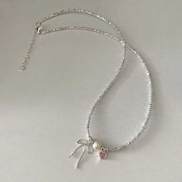 Colliers pendents Minar Luxury Rose Couleur CZ Zircon Heart Bowknot Simulate Perle Pendant Colliers pour femmes Chaîne d'onde d'eau argentée brillante