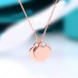 Colliers pendentifs Rose double coeur collier accessoires en gros en forme de coeur en acier inoxydable double coeur bijoux noël dames femme amie pendentif