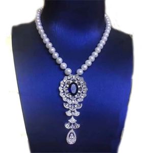Pendentif Colliers YKNRBPH 2023 Collier de perles d'eau douce naturelles pour femmes Blue Zircon Boutique Tempérament Chaînes de pull 231123