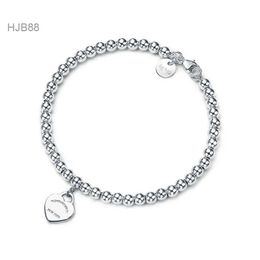 Colgantes Joyería de lujo Diseñador Tiffanyitys Charm Pulseras Popular S925 Plata 4 mm Cuentas redondas Pulsera en forma de corazón Chapado inferior más grueso Boud 05ZC