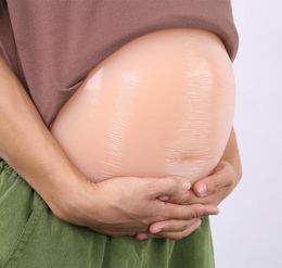 Propiedades de actuación La fiesta del vientre embarazada se viste del vientre falsos para el rendimiento espurio del belly del embarazo2519849