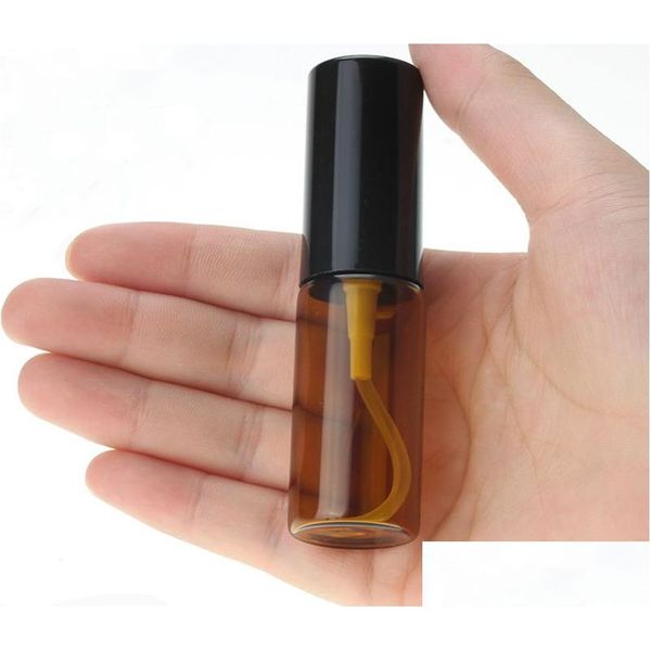 Bouteille de parfum en gros 1000pcs / lot 10 ml 15 ml 20 ml bouteilles de pulvérisation ambre rechargeables vides par pulvérisateur avec couvercles noirs en stock Drop D Dh9Bs