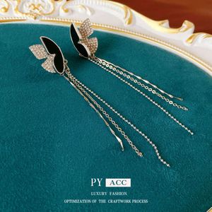 Gepersonaliseerde diamant vlinder Tassel Koreaans Instagram, minimalistisch ontwerp, geen gaten, botclip, niche -ooraccessoires voor vrouwen