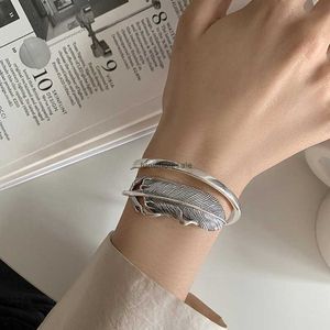 Bracelet à plumes simples à l'ancienne et à l'ouvre-plumes Sterling 925 Bracelet Cool Wind Industry Light Luxury Lovers Lovers Bracelet