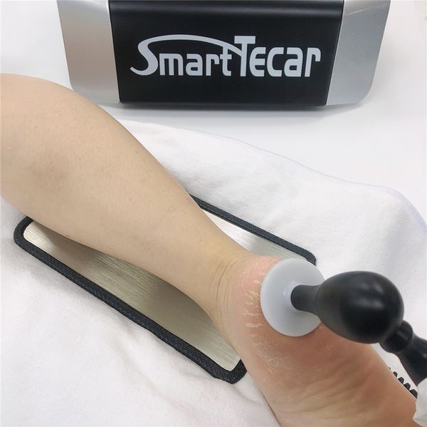 Clinique de physiothérapie Articles de massage Machine de thérapie Tecar pour les blessures sportives, entorse de la cheville, fasciite plantaire et soulagement de la douleur sur tout le corps