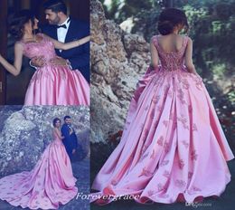 Vestido de graduación de color rosa Modest dijo Mhamad Long sin mangas Apliques sin espalda de desgaste formal Vestido de fiesta personalizado de talla grande3136232