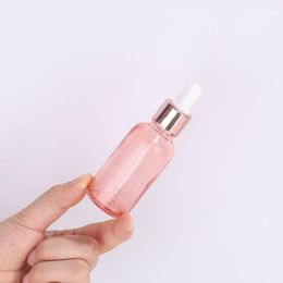 Frasco gotero de vidrio rosa Frascos de suero de aceite esencial con tapa de oro rosa 5-100ml Ekaci